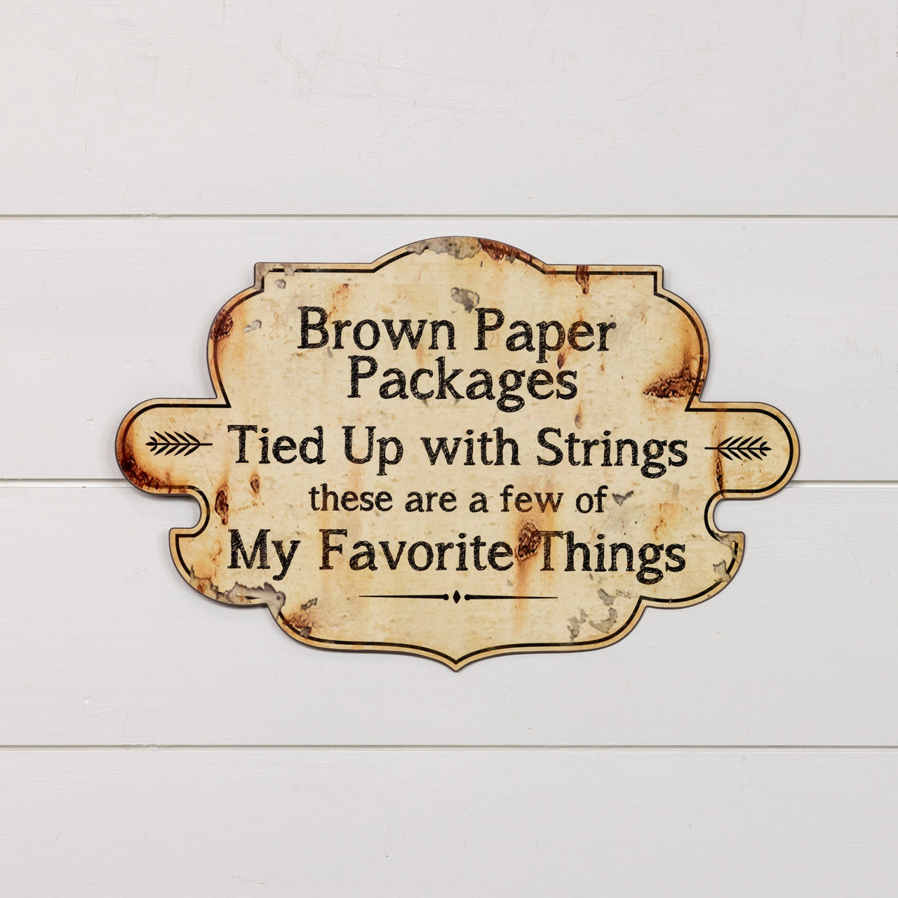 Metal wall sign with a decorative frame design