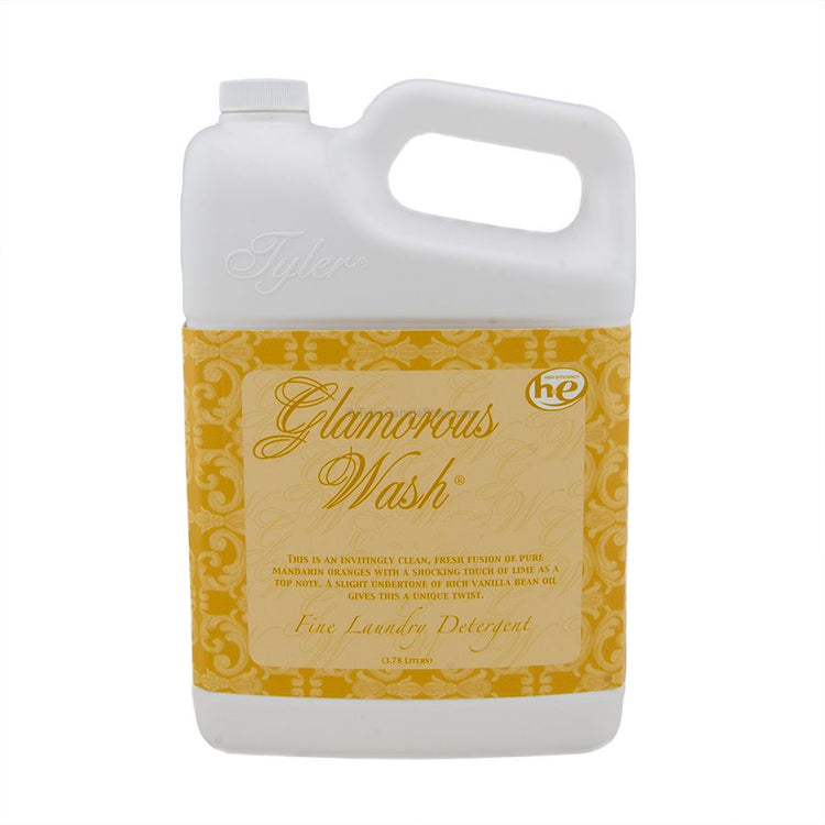A 3.78L white plastic jug of Tyler Glamorous Wash laundry detergent with a yellow patterned label.