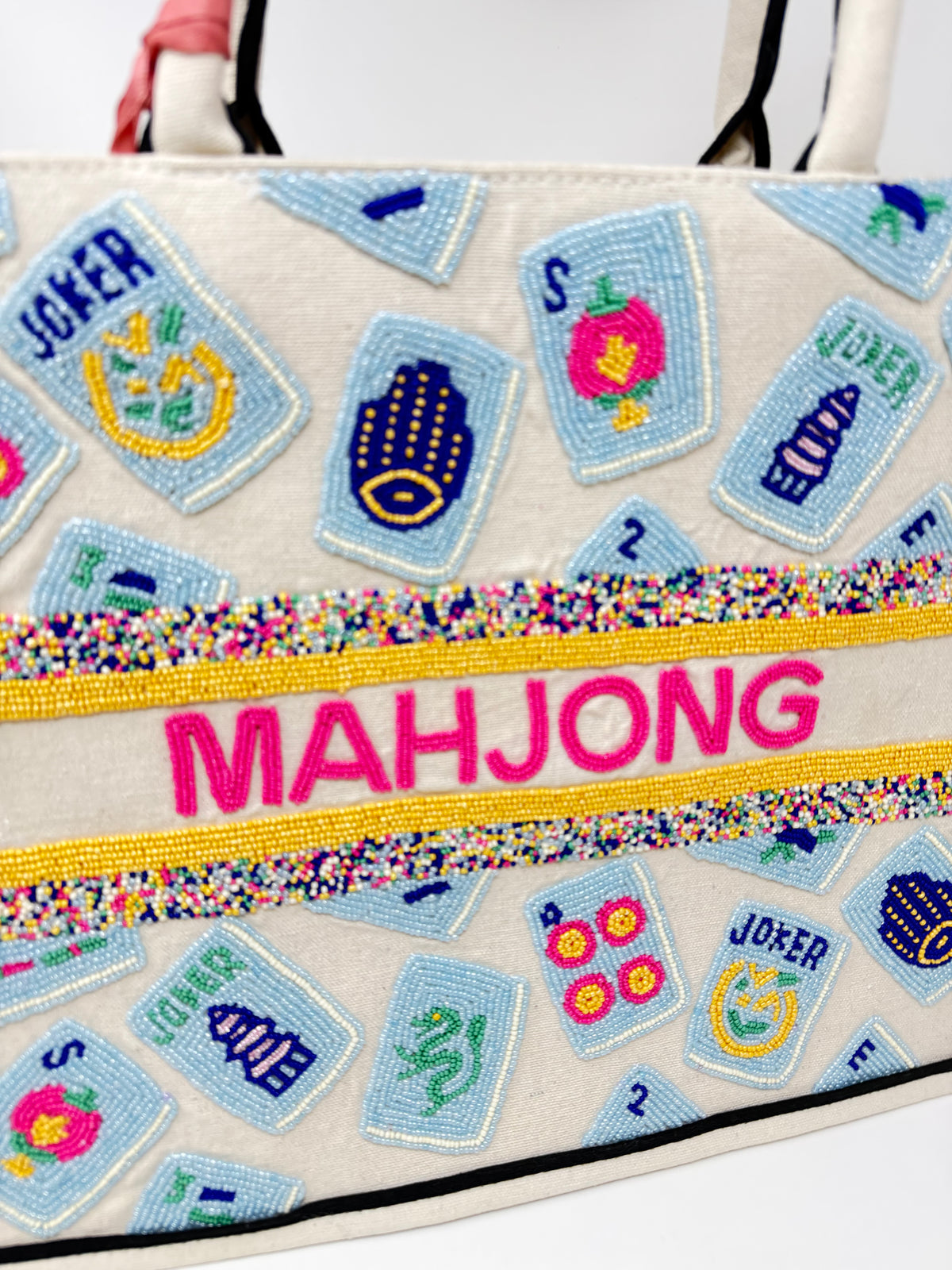 Hand-beaded tote bag featuring blue mahjong tiles and pink 'MAHJONG' text in beads.
