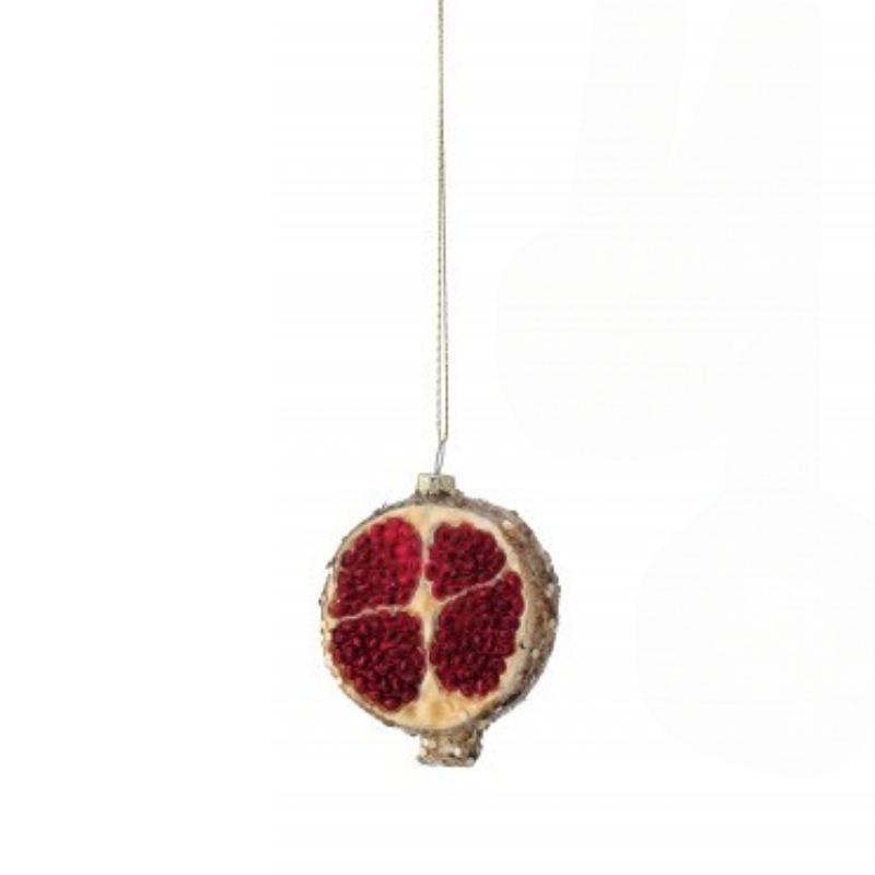 3.5-inch glass ornament shaped like a sliced pomegranate with red seeds and a glittery gold rind.