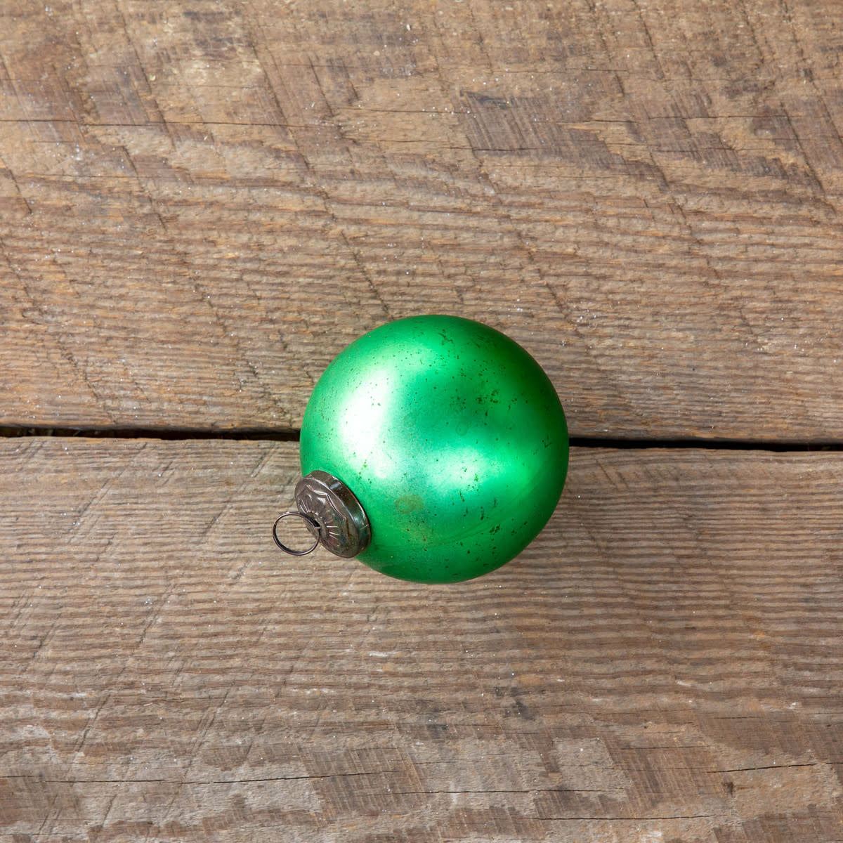 Medium matte emerald glass ball ornament with antique finish