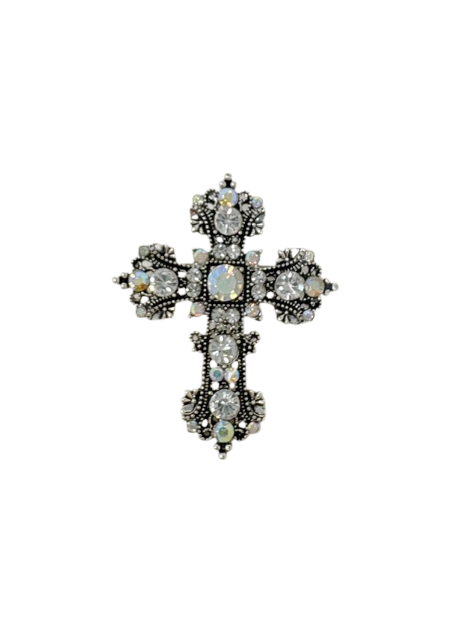 Silver-tone cross brooch featuring intricate filigree and clear iridescent gemstones.