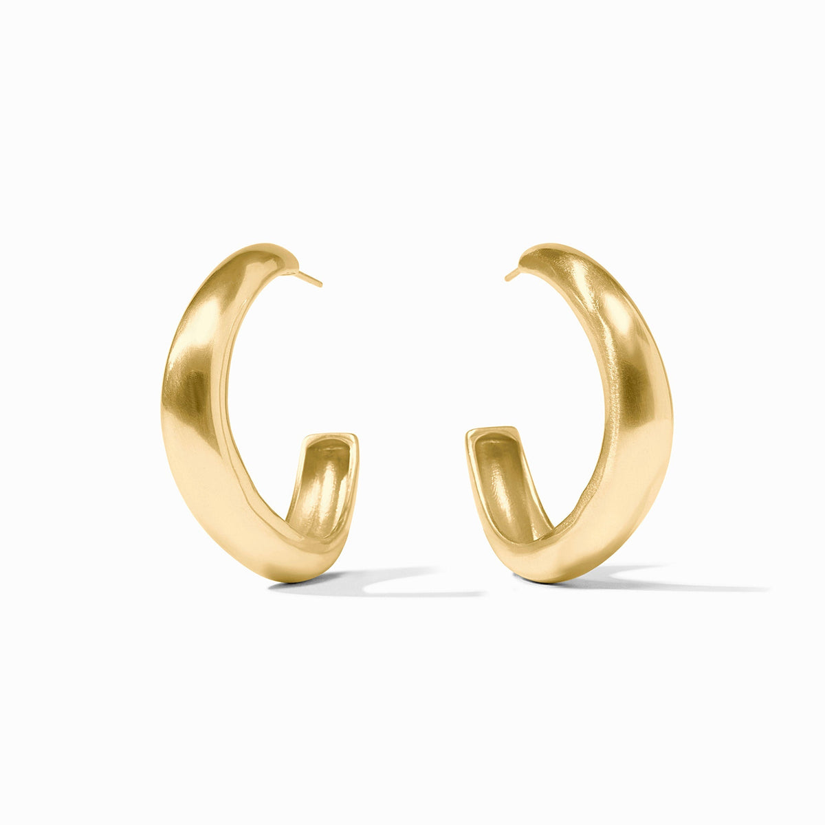 Pair of thick, 24K gold plated Wave Hoop earrings for pierced ears on a white background.