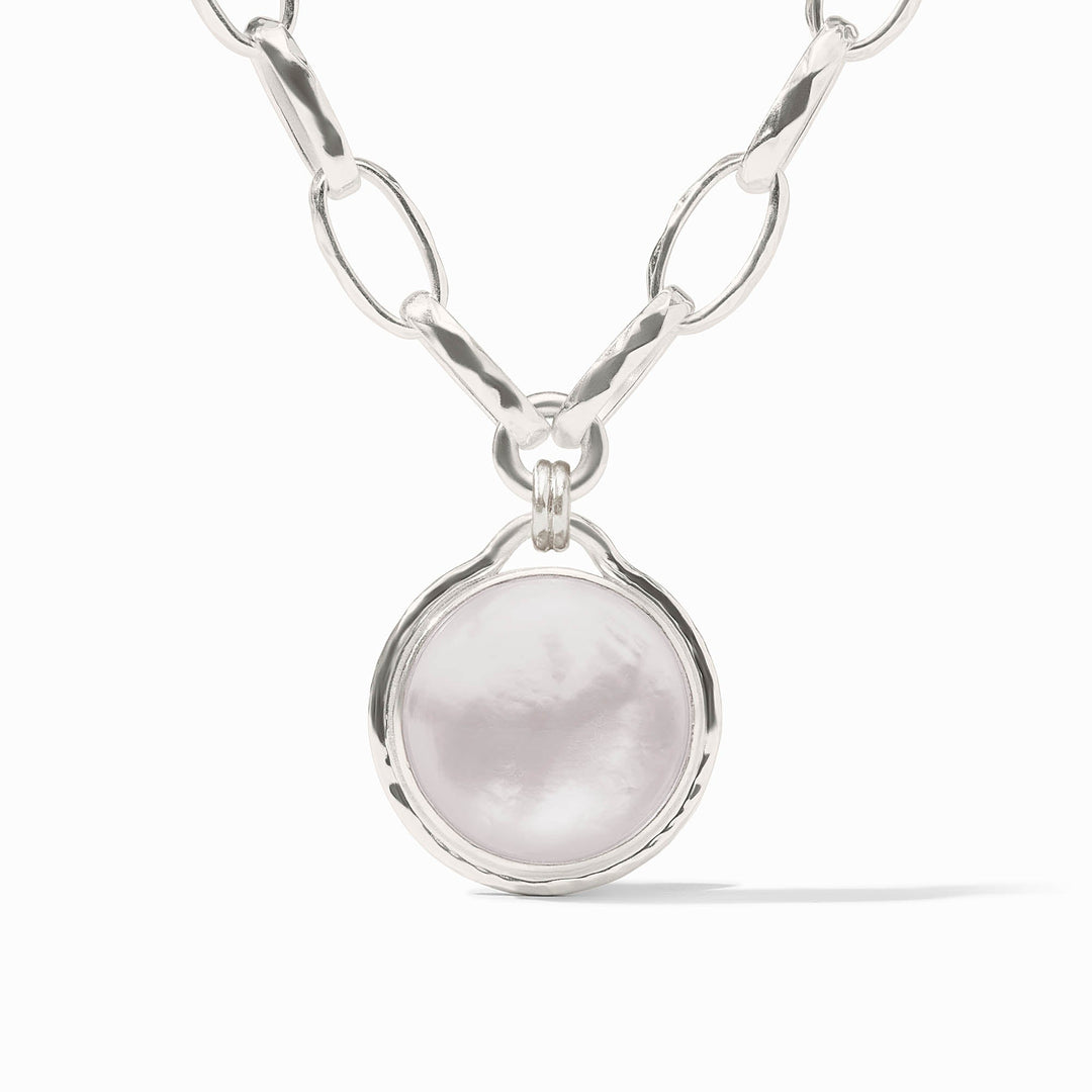 Solara Statement Necklace featuring a round white glass pendant on a silver-tone link chain.