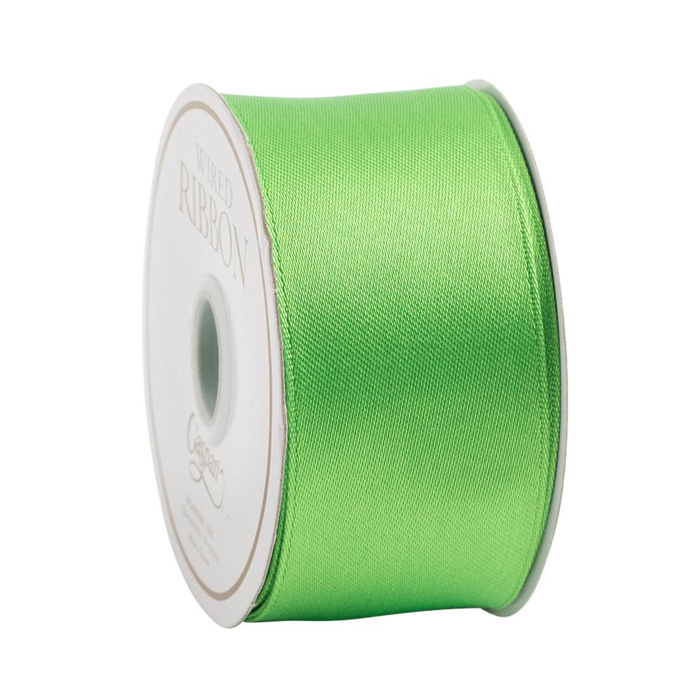 A roll of wired ribbon in a neutral tone with an elegant patterned texture.