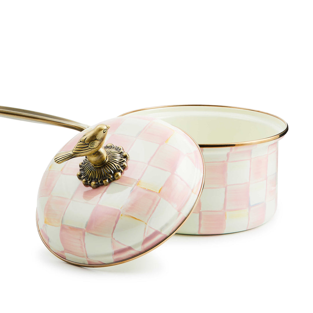 Rosy Check 2.5 Qt. Saucepan with hand-painted pink and white checks and a bird-shaped brass knob.