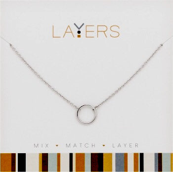 Silver Open Circle Layers Necklace on a white display card with the brand name Layers.