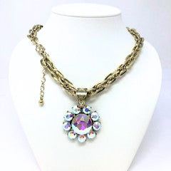 Vintage gold tone chain necklace featuring round rainbow aurora borealis rhinestones