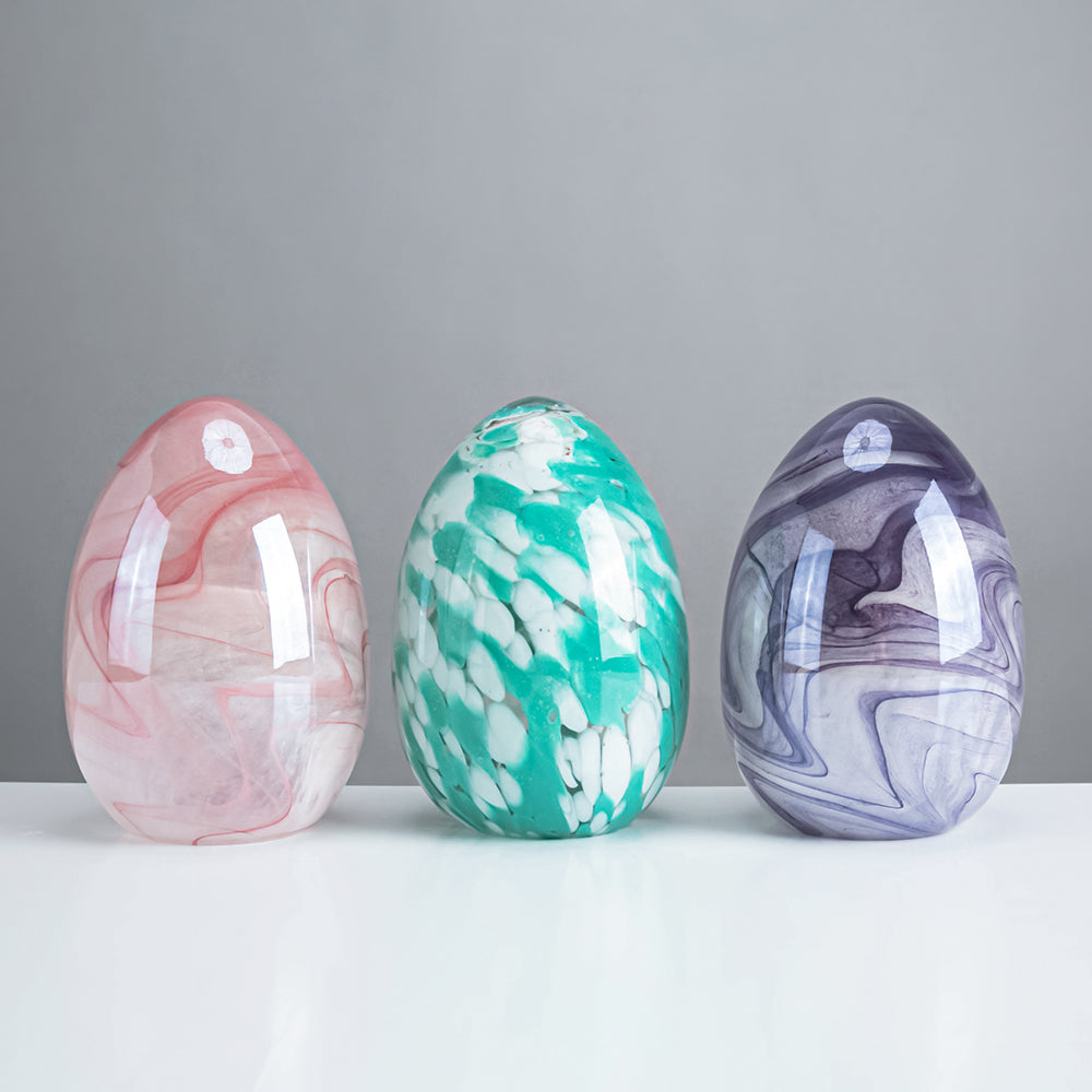 7.1-inch clear glass Easter egg with a smooth oval silhouette.