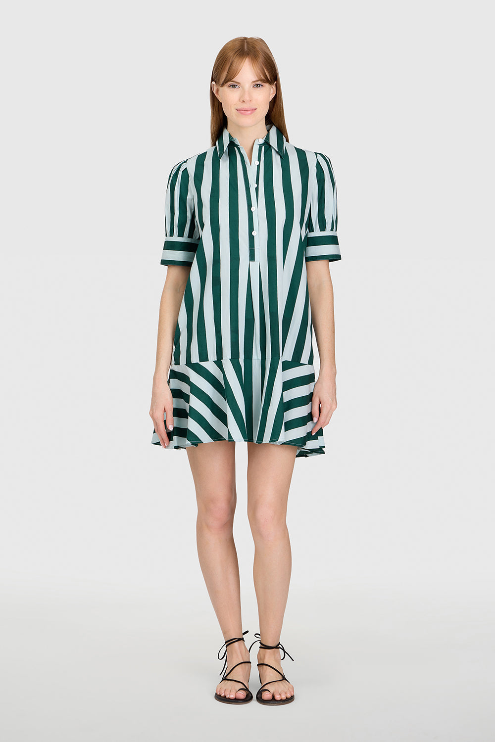 Joan Liv mini dress in black with puff sleeves and a collared neck.