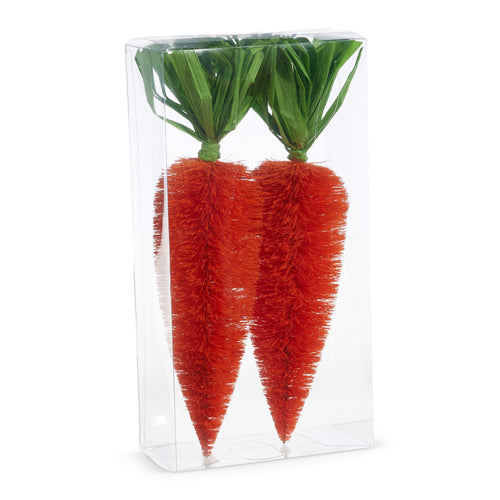 Box of eleven-and-a-half-inch bottle brush carrots made from sisal and paper with a navy blue color.
