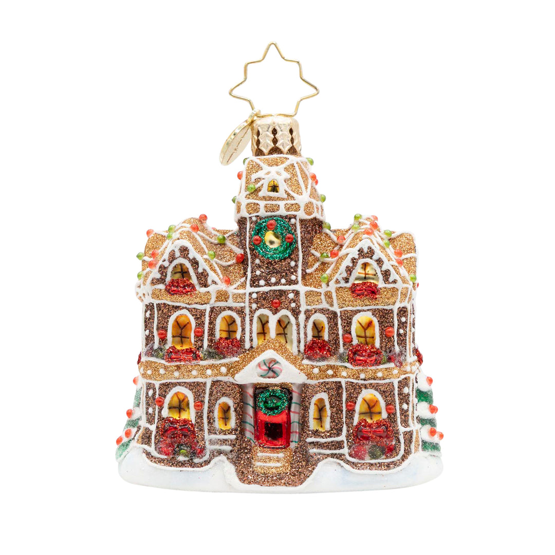 Gingerbread Manor Gem glass ornament with glitter, candy accents, and a star-shaped hanger.