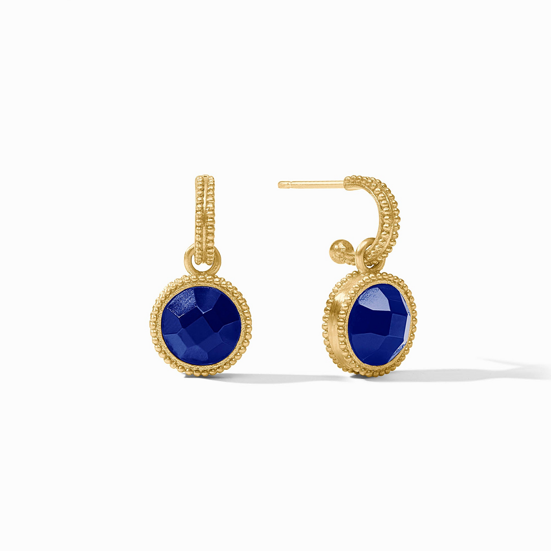 Fleur-de-Lis gold hoop earrings with round faceted blue glass charms and beaded texture.