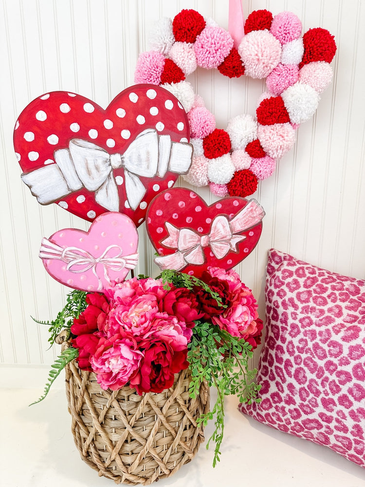 Medium stake heart in red with white polka dot pattern
