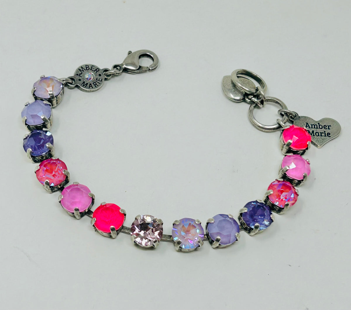 Classic Malibu bracelet featuring lavender, lilac, white, and light green stones with an amber tag and Scotty dog heart charm.