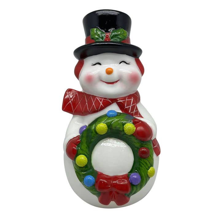 12-inch snowman blow mold figure wearing a top hat and scarf, holding a decorated Christmas wreath.