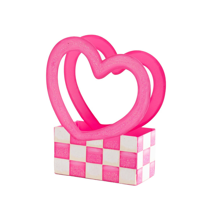 Heart-shaped box with a soft pink finish.
