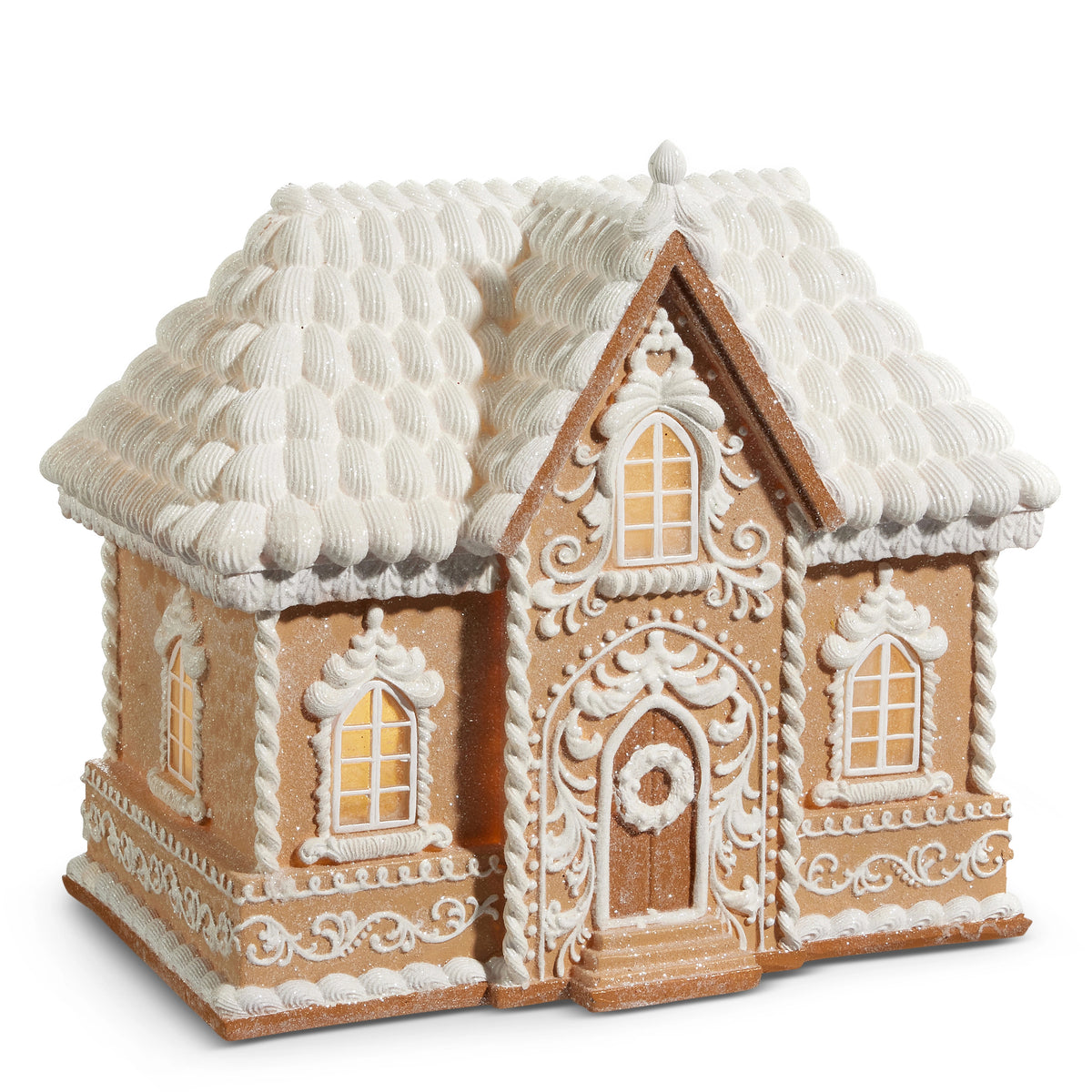 17.5-inch lighted resin gingerbread house with white frosting roof and intricate icing details.