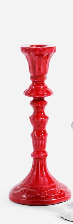 Metal Americano candle holder with a sleek cylindrical shape.