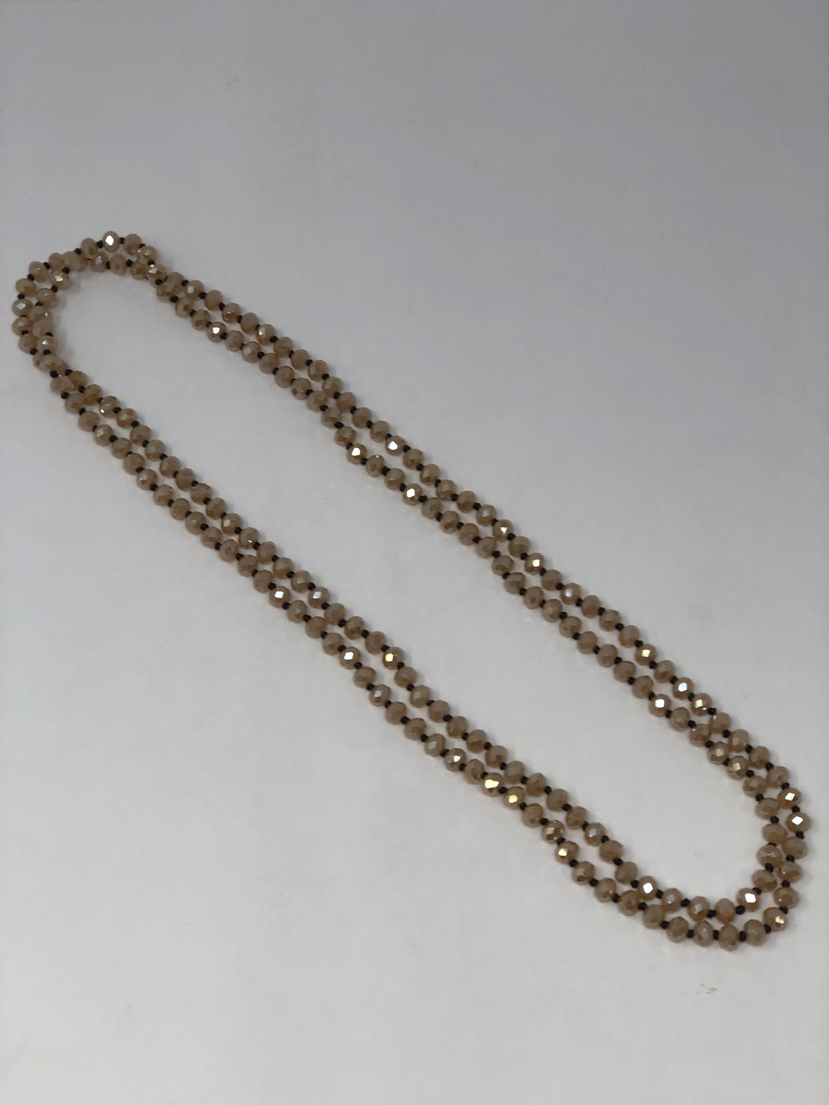 60-inch dark brown crystal beaded necklace with knotting between beads