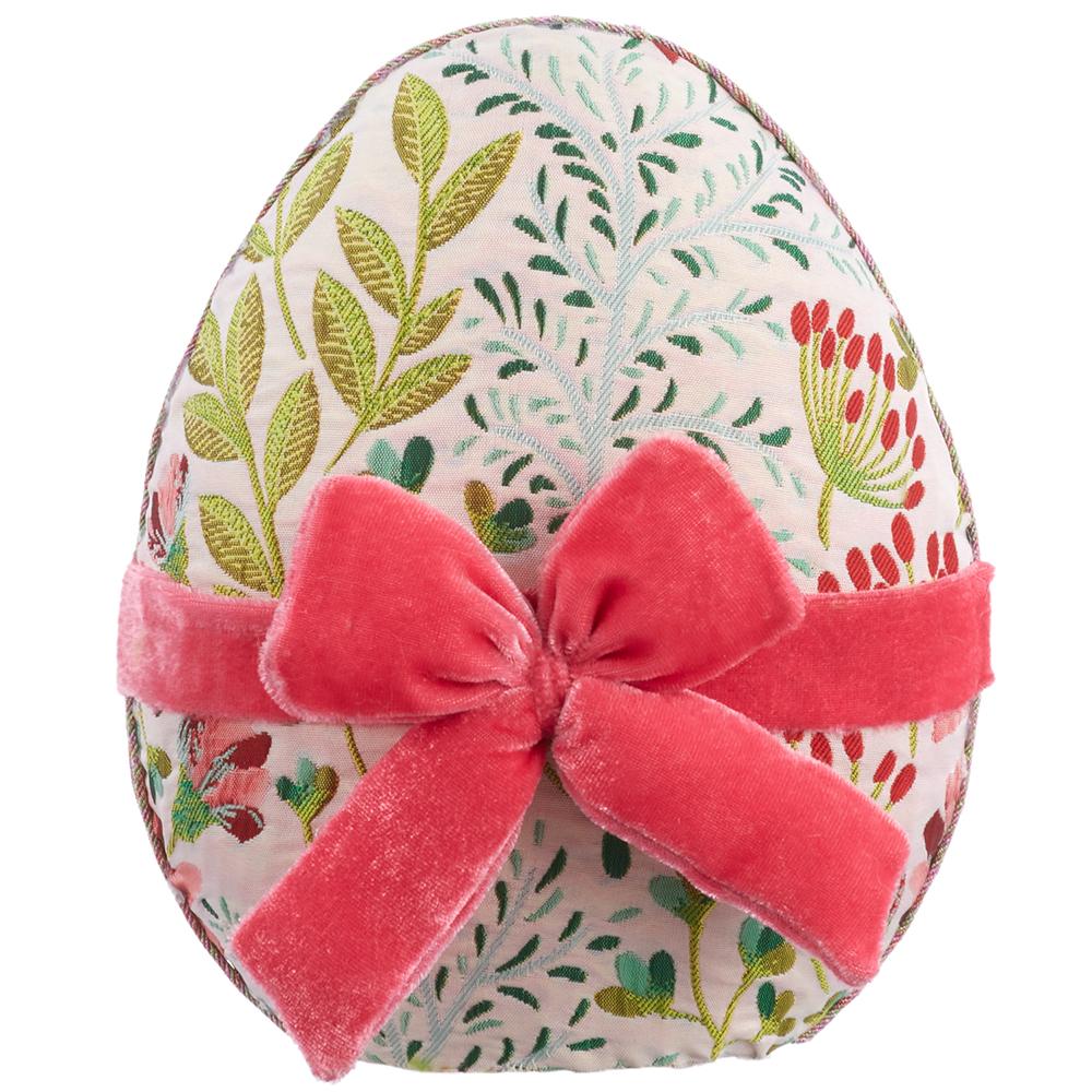 7.5-inch egg-shaped pillow in pink with green fabric top over polyfoam core