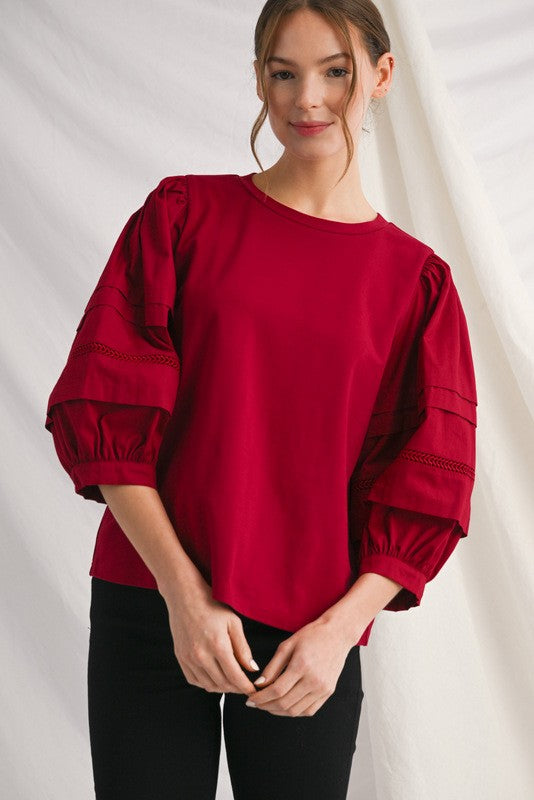 Alice solid top with ladder lace trim at neckline and cuffs