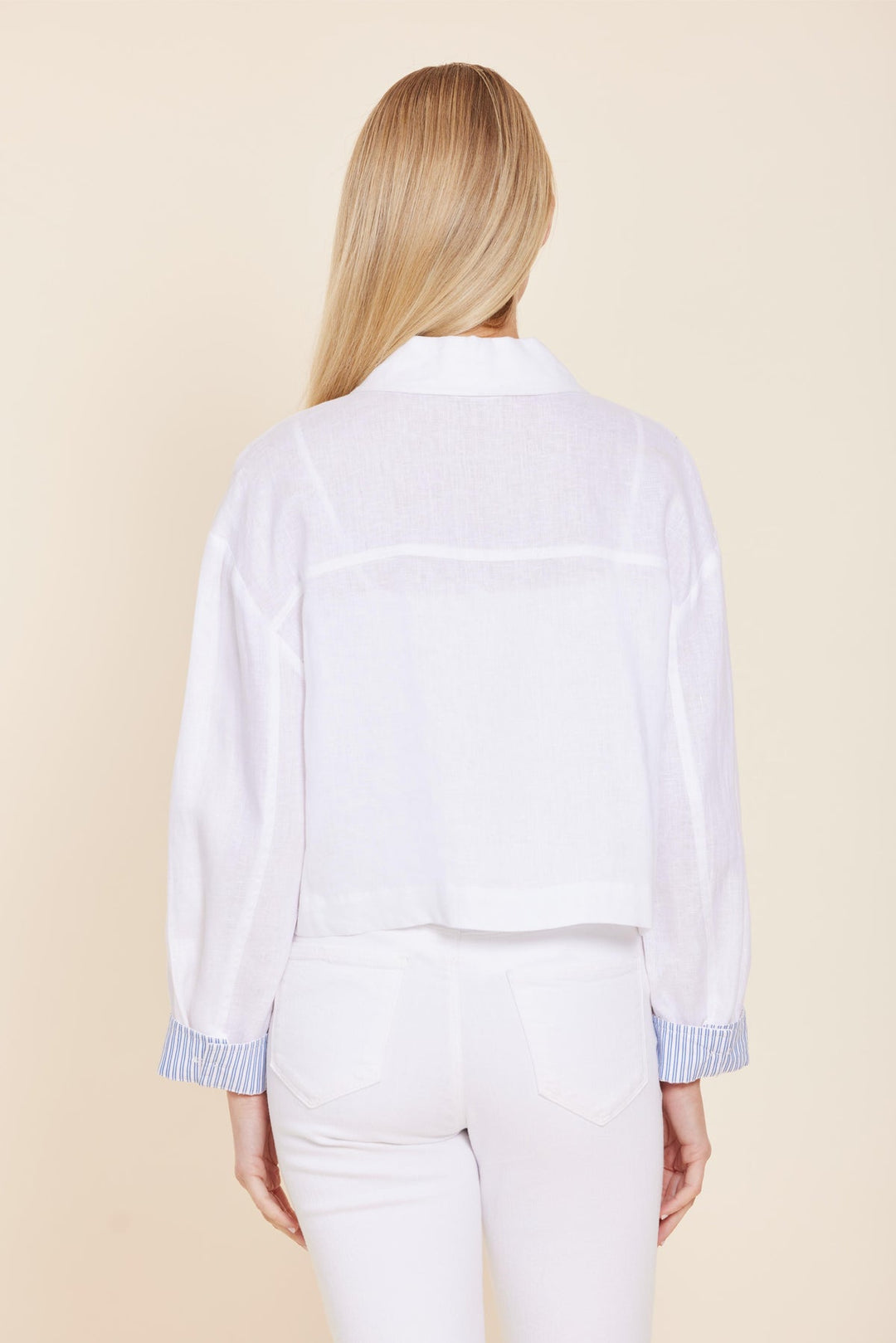 Relaxed fit Grace linen jacket in natural tone with classic button-up front and distinctive pin stripe cuffs.