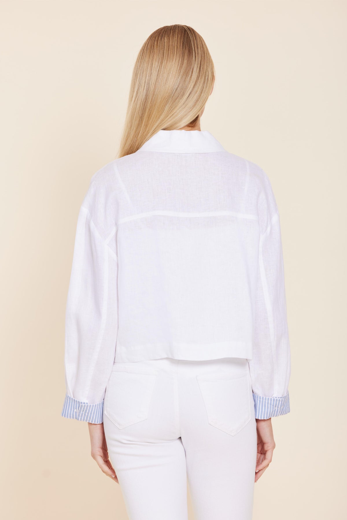 Relaxed fit Grace linen jacket in natural tone with classic button-up front and distinctive pin stripe cuffs.