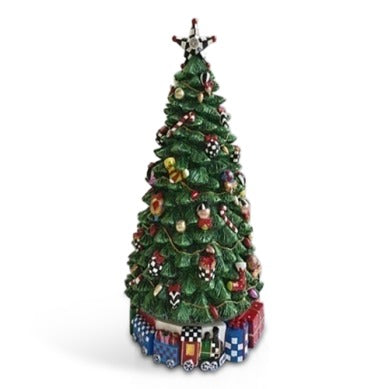 Christmas Carol Rotating Musical Tree with colorful ornaments, star topper, and toy train base.