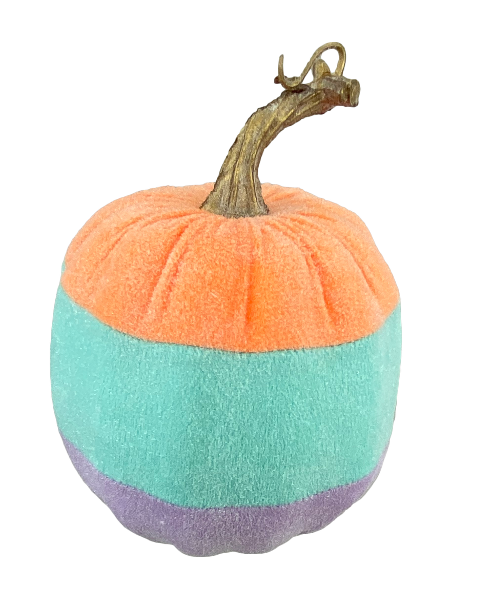 Small candy corn pumpkin decoration with orange body, yellow stem, and black facial features.