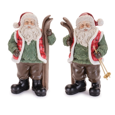 Set of two 9.75-inch resin Santa figures on skis with red suits and white beards.