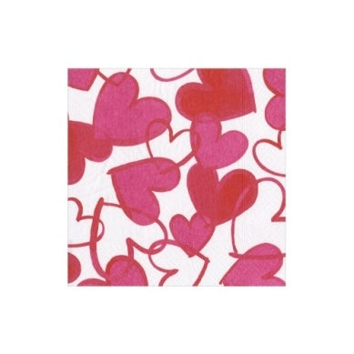 Triple-ply recycled cocktail napkin with a painted hearts pattern in red on white.