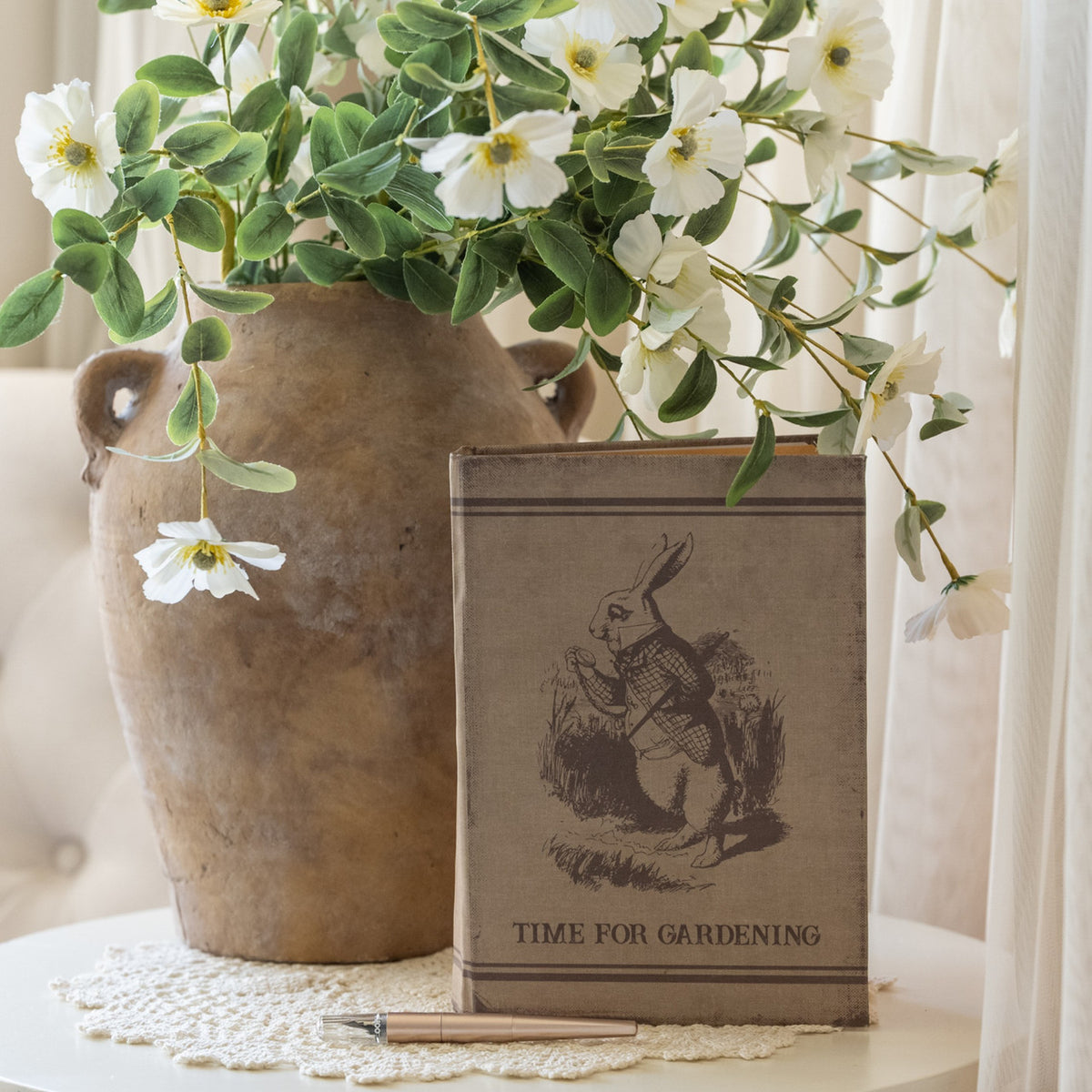 Hardcover gardening journal with wood cover featuring a botanical illustration.