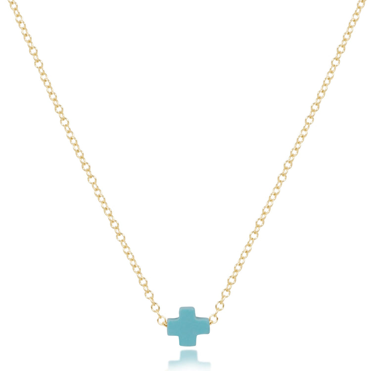 16-inch 14kt gold-filled chain necklace featuring a small turquoise-colored signature cross pendant.
