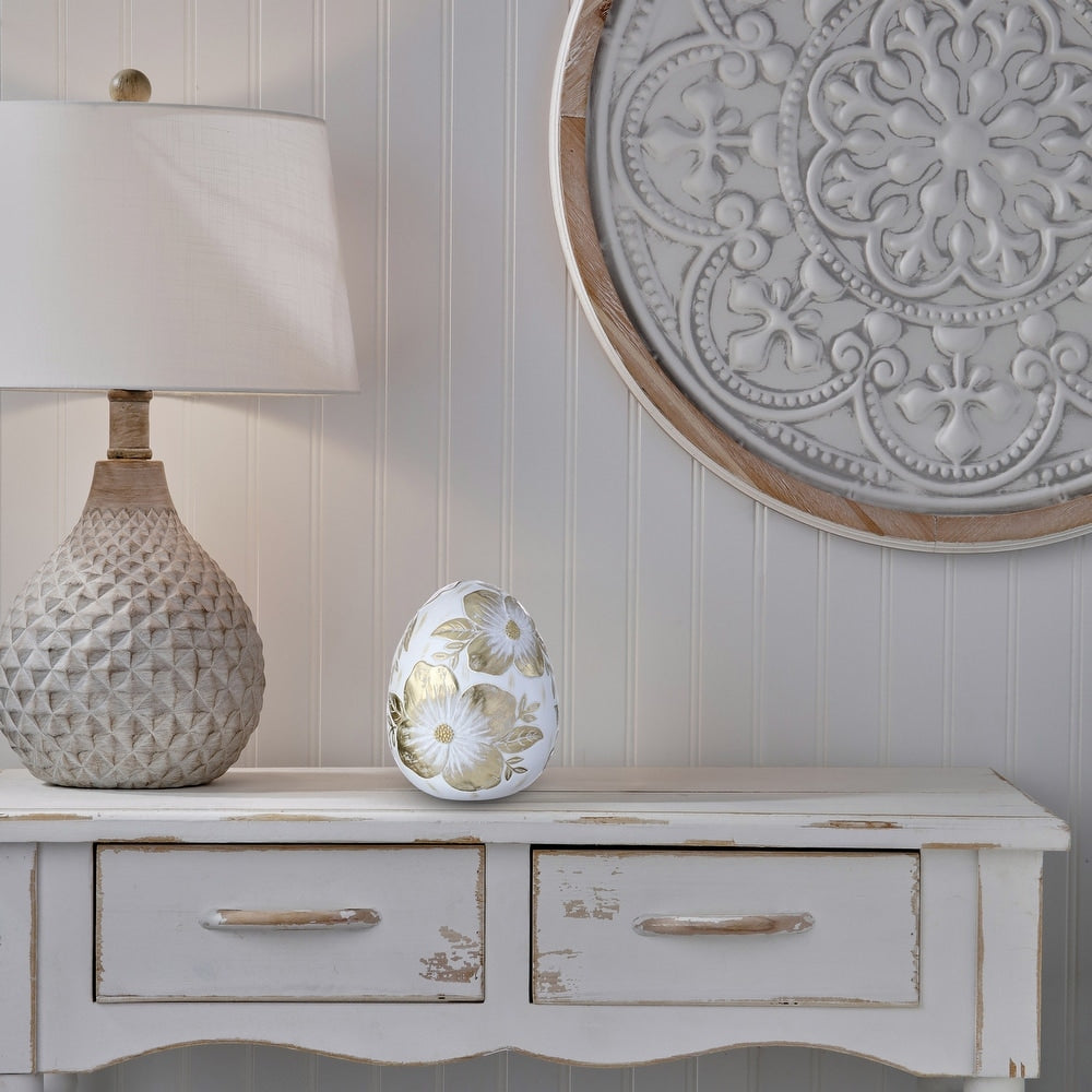 6-inch resin egg decorated with intricate royal dogwood flower accents in vibrant colors.