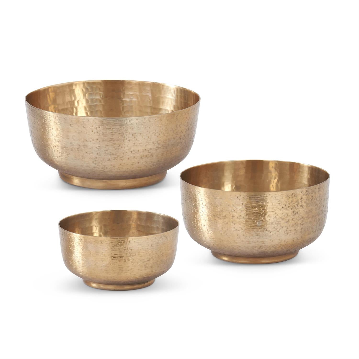 Set of three textured antiqued gold footed bowls in varying sizes.