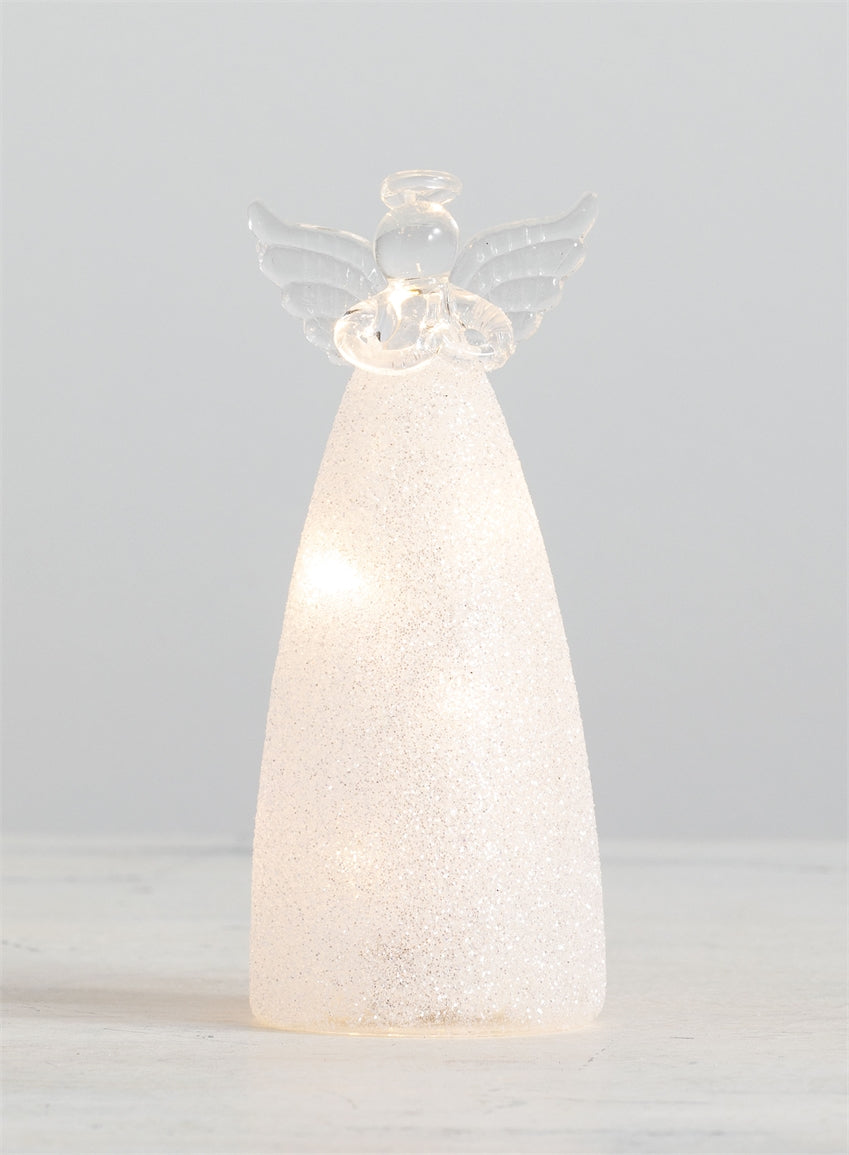 Clear glass LED light angel figurine with glitter accents standing six inches tall.