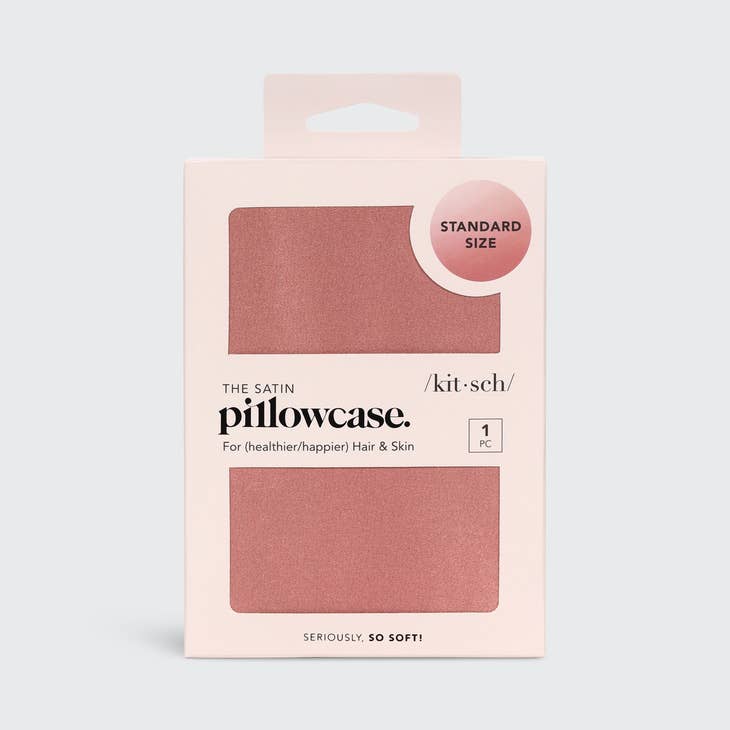 Satin pillowcase in a soft neutral tone with smooth texture.