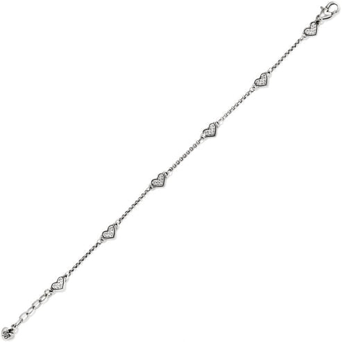 Silver-plated Kiss & Tell Anklet featuring a delicate chain with crystal-studded heart charms.