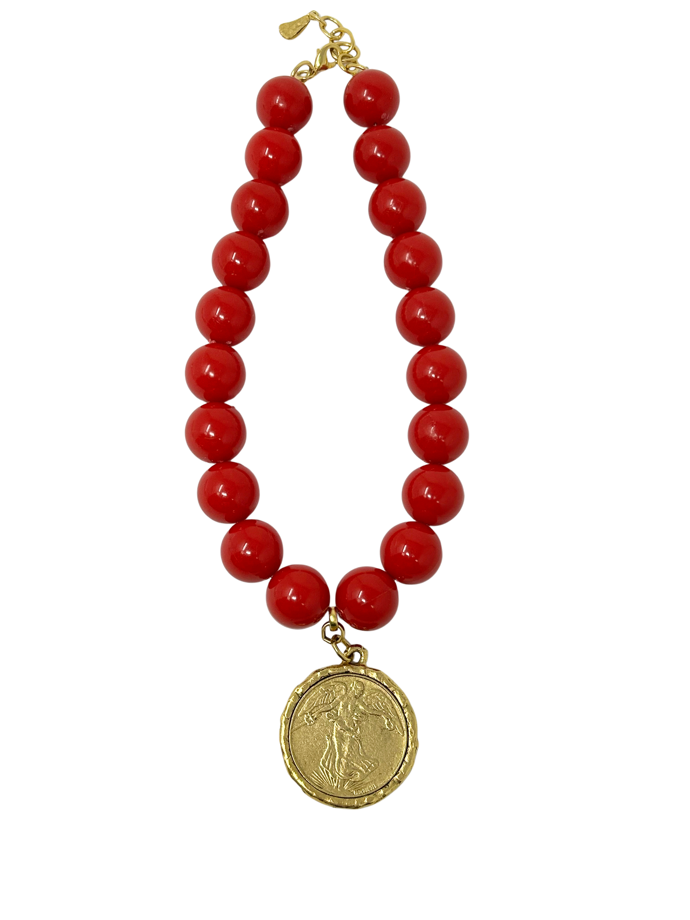 Vintage 18-inch necklace featuring large red beads and a 1-inch gold-tone coin medallion pendant.