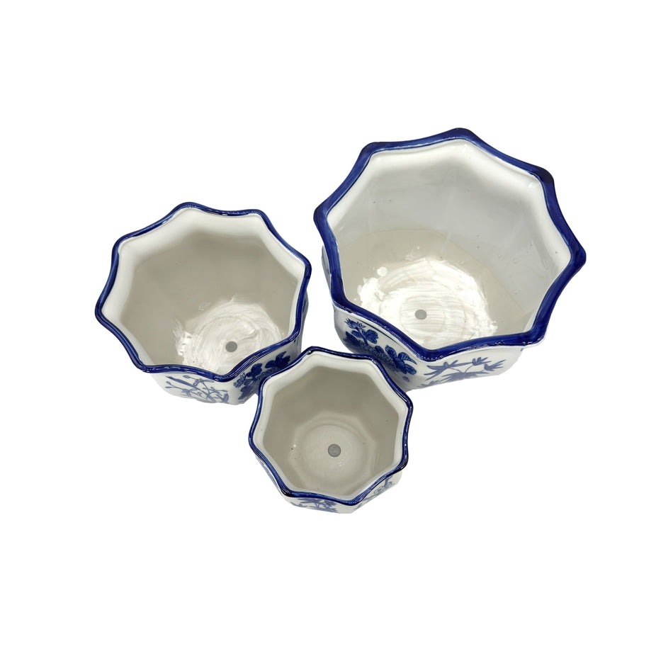 White ceramic hexagonal planter with blue chinoiserie fluting pattern