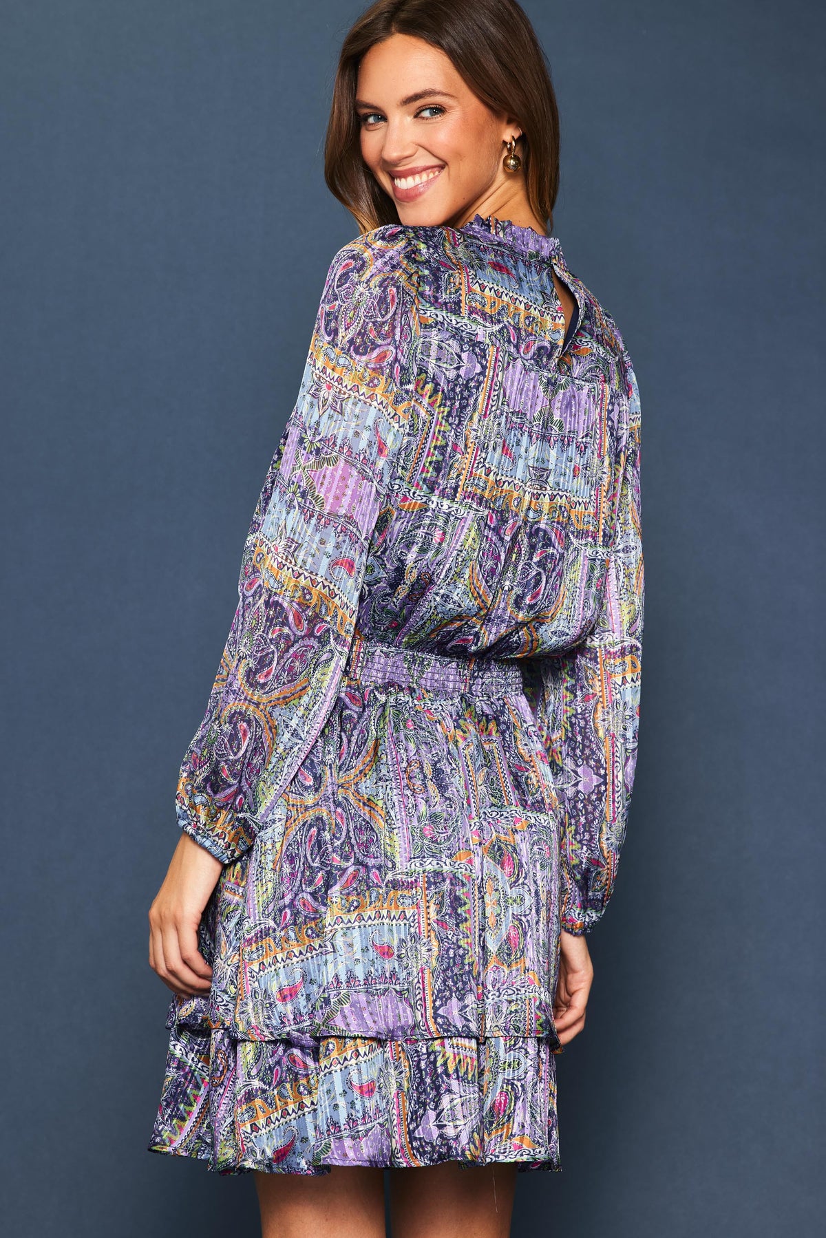 Lydia long sleeve mini dress in black polyester with floral print.