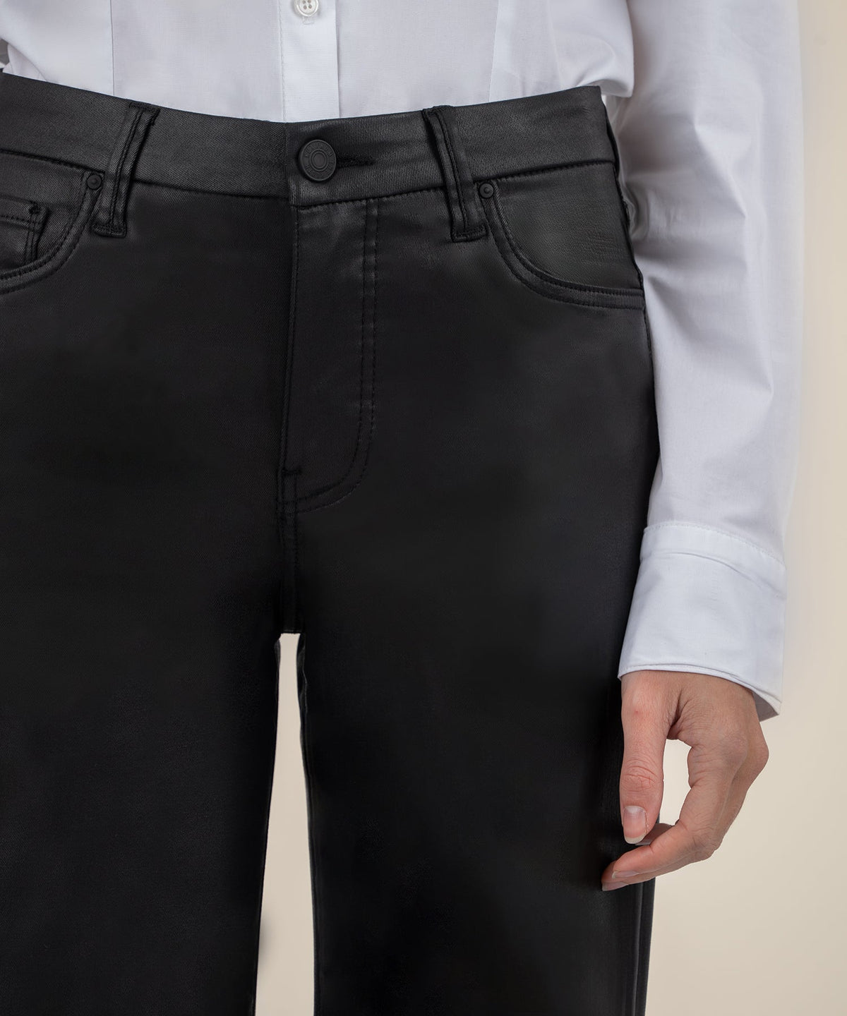 Katelyn Meg high-rise wide-leg pants in a modal blend fabric with an asymmetrical hem.