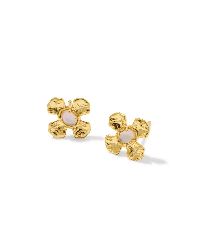 Leanne gold stud earrings with textured floral petals and a white stone center.