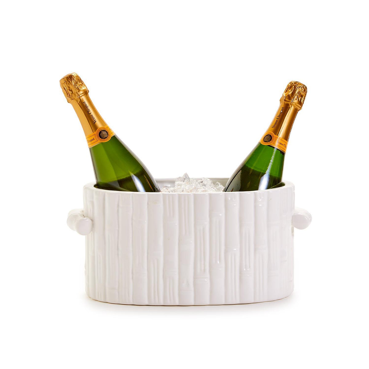 White ceramic faux bamboo oval cachepot with handles, used as an ice bucket with two wine bottles.