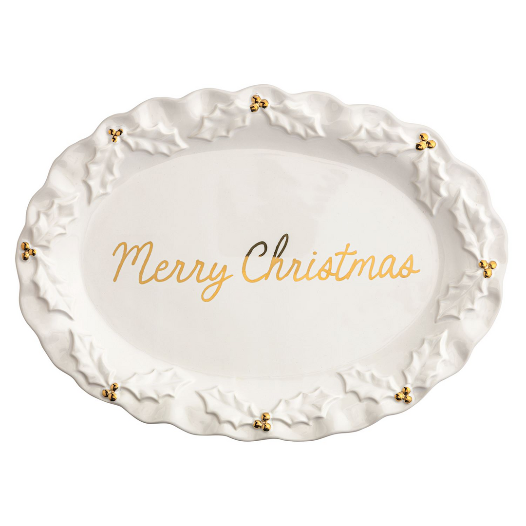 White stoneware oval platter with gold Merry Christmas script and holly leaf rim with gold berries.