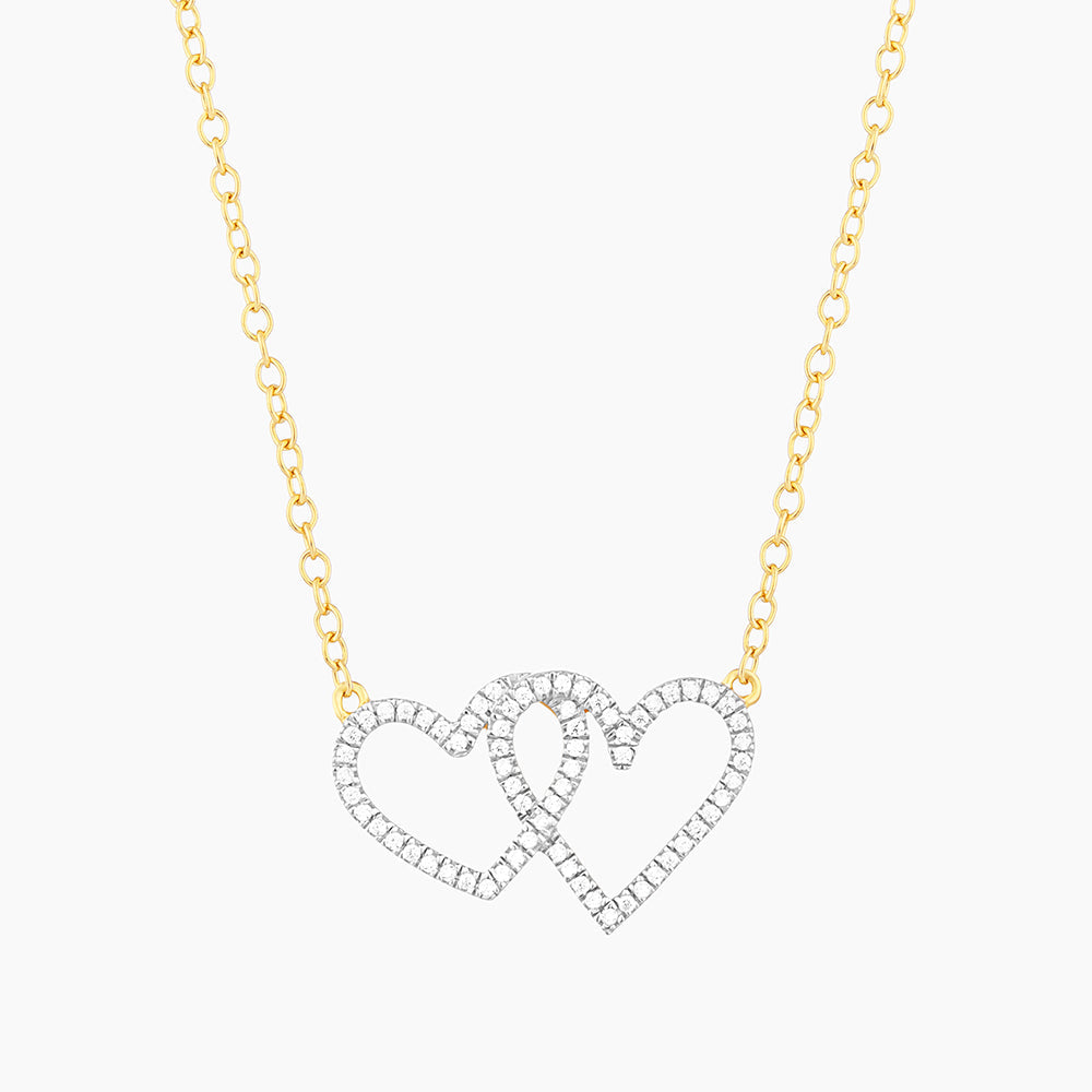 Waterproof stainless steel pendant necklace with two hearts in gold-plated finish on a silver chain.