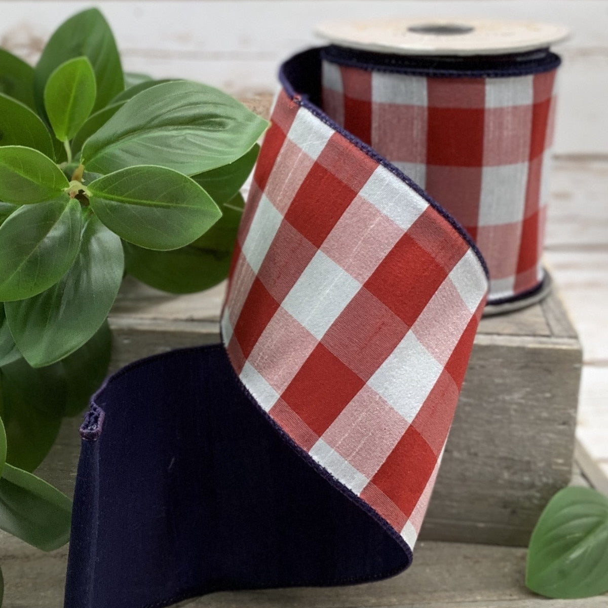 Navy blue faux dupion ribbon with a check pattern featuring red and white stripes.