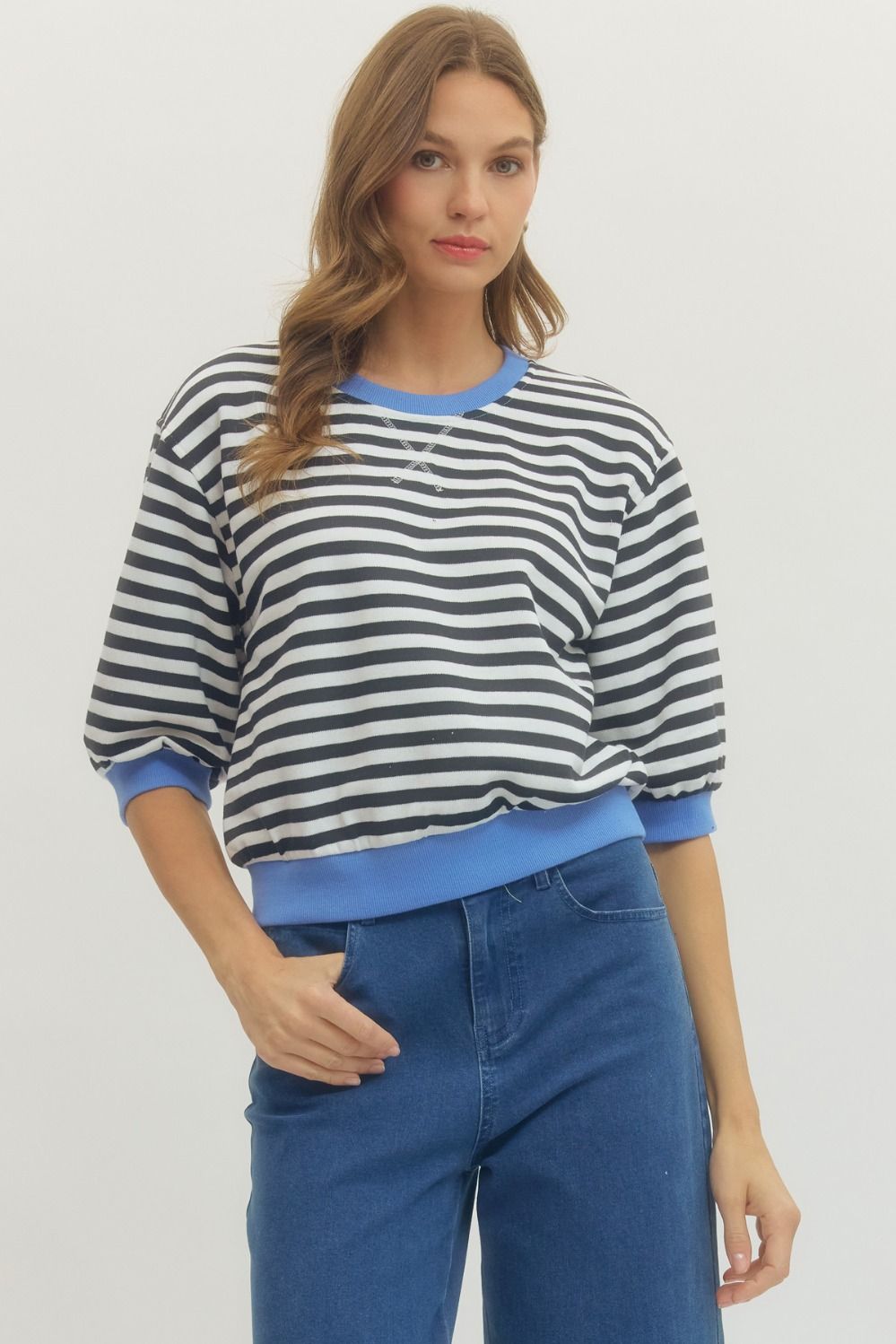 Sandra striped half-sleeve knit top in a cotton-polyester blend with a relaxed silhouette.