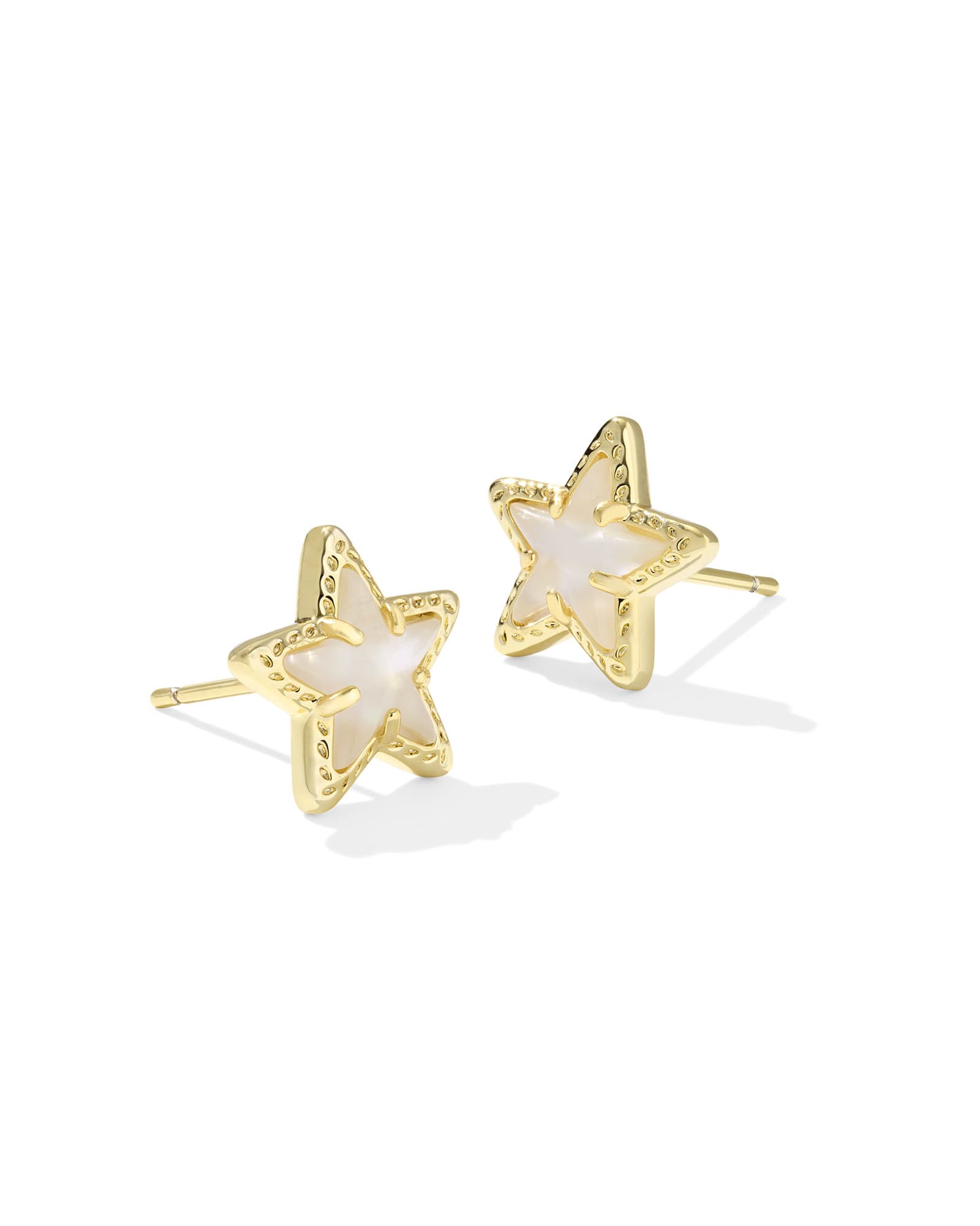 Gold Cassidy stud earrings featuring a star-spangled crystal center on an ear post.